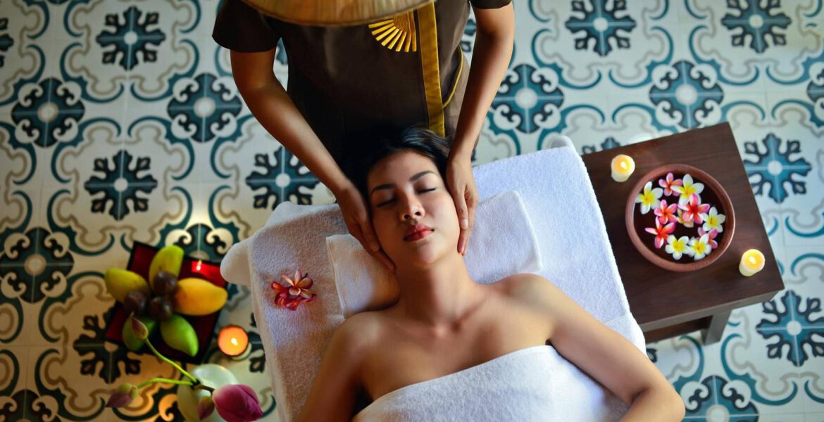 A woman is having a facial massage